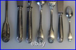 Ménagère Christofle en métal argenté modèle coquille Ménagère Christofle en métal argenté modèle coquille