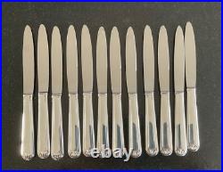 Ménagère métal argenté modèle Art Déc 61 pièces