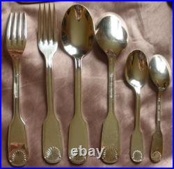 Ménagère métal inox argenté modèle Coquille 36 pièces manque 1 fourchette