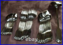 Ménagère métal inox argenté modèle Coquille 36 pièces manque 1 fourchette