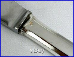 Orbrille, 12 couteaux de table modèle Uniplat, métal argenté