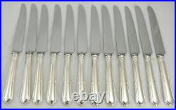 Orbrille modèle Contours, 12 couteaux de table, métal argenté, excellent état