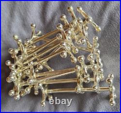 Orfèvrerie ERCUIS 12 porte couteaux en métal argenté modèle Croix & boules