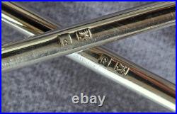 Orfèvrerie ERCUIS 12 porte couteaux en métal argenté modèle Croix & boules