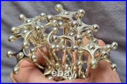 Orfèvrerie ERCUIS 12 porte couteaux en métal argenté modèle Croix & boules