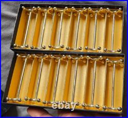 Orfèvrerie ERCUIS 12 porte couteaux en métal argenté modèle Croix & boules