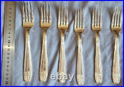 POT 12 fourchettes de table en métal argenté modèle art déco Grand Prix