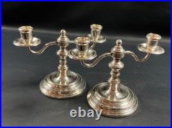 Paire de bougeoirs bouts de table en métal argenté signé CHRISTOFLE modèle Albi