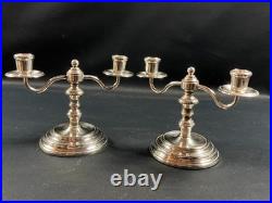 Paire de bougeoirs bouts de table en métal argenté signé CHRISTOFLE modèle Albi