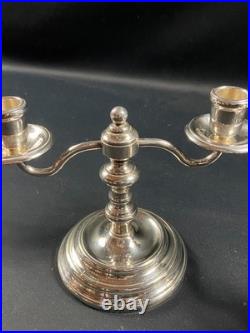 Paire de bougeoirs bouts de table en métal argenté signé CHRISTOFLE modèle Albi