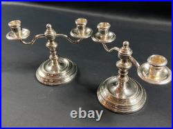 Paire de bougeoirs bouts de table en métal argenté signé CHRISTOFLE modèle Albi