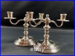 Paire de bougeoirs bouts de table en métal argenté signé CHRISTOFLE modèle Albi