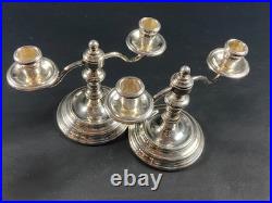 Paire de bougeoirs bouts de table en métal argenté signé CHRISTOFLE modèle Albi