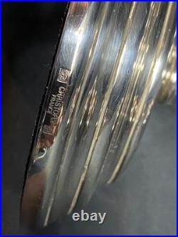 Paire de bougeoirs bouts de table en métal argenté signé CHRISTOFLE modèle Albi