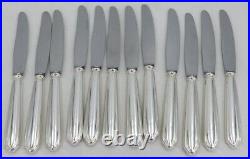 Ravinet d'Enfert, 12 couteaux à entremets/dessert, modèle Club, métal argenté