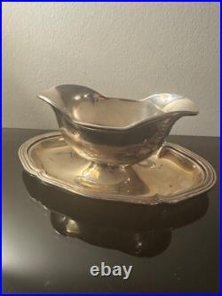 Saucière CHRISTOFLE modèle COQUILLE VENDOME en métal argenté