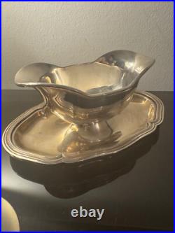 Saucière CHRISTOFLE modèle COQUILLE VENDOME en métal argenté