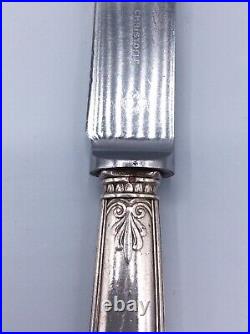 Série de cinq couteaux de table en métal argenté Christofle modèle Malmaison