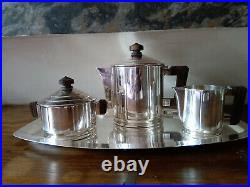 Service à thé Art Déco en métal argenté modèle Saïgon ERCUIS