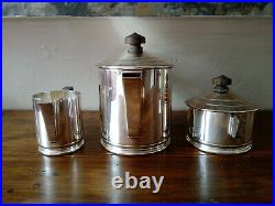 Service à thé Art Déco en métal argenté modèle Saïgon ERCUIS