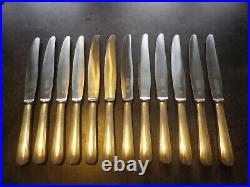 Service de 12 couteaux de table en métal argenté Christofle modèle Boreal